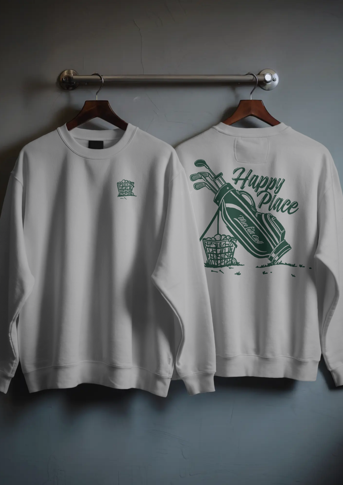 Front and back of the Happy Place golf sweatshirt in Grey Marl on hangers, showing the golf bag and Happy Place script
