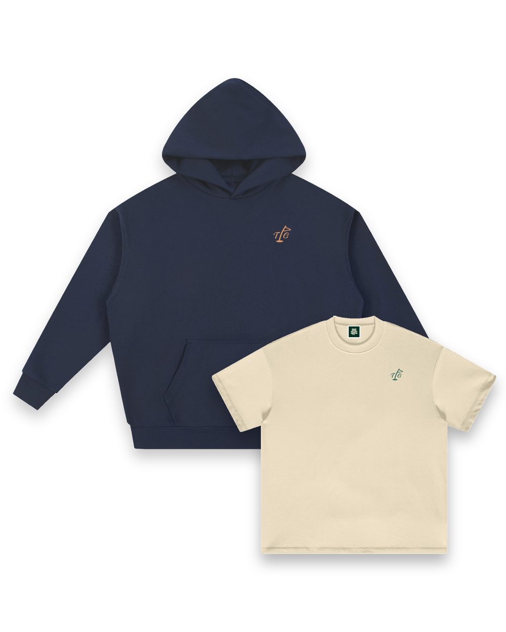 Three on the Green hoodie in Navy seen from the front, layered behind the Three on the Green tee in Cream