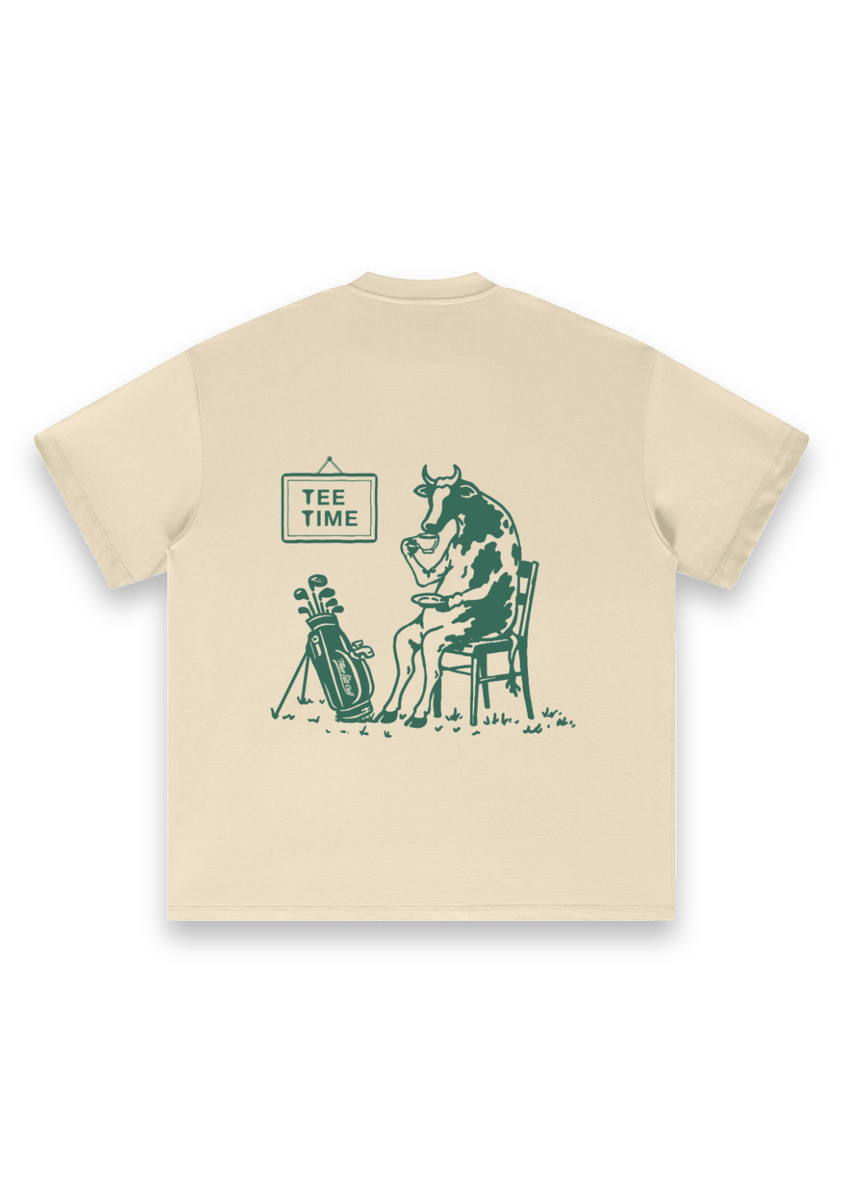 Tee Time golf T-shirt in Cream, back view showing the cow having a cup of tea beside its clubs under the Tee Time sign #Colour_Cream
