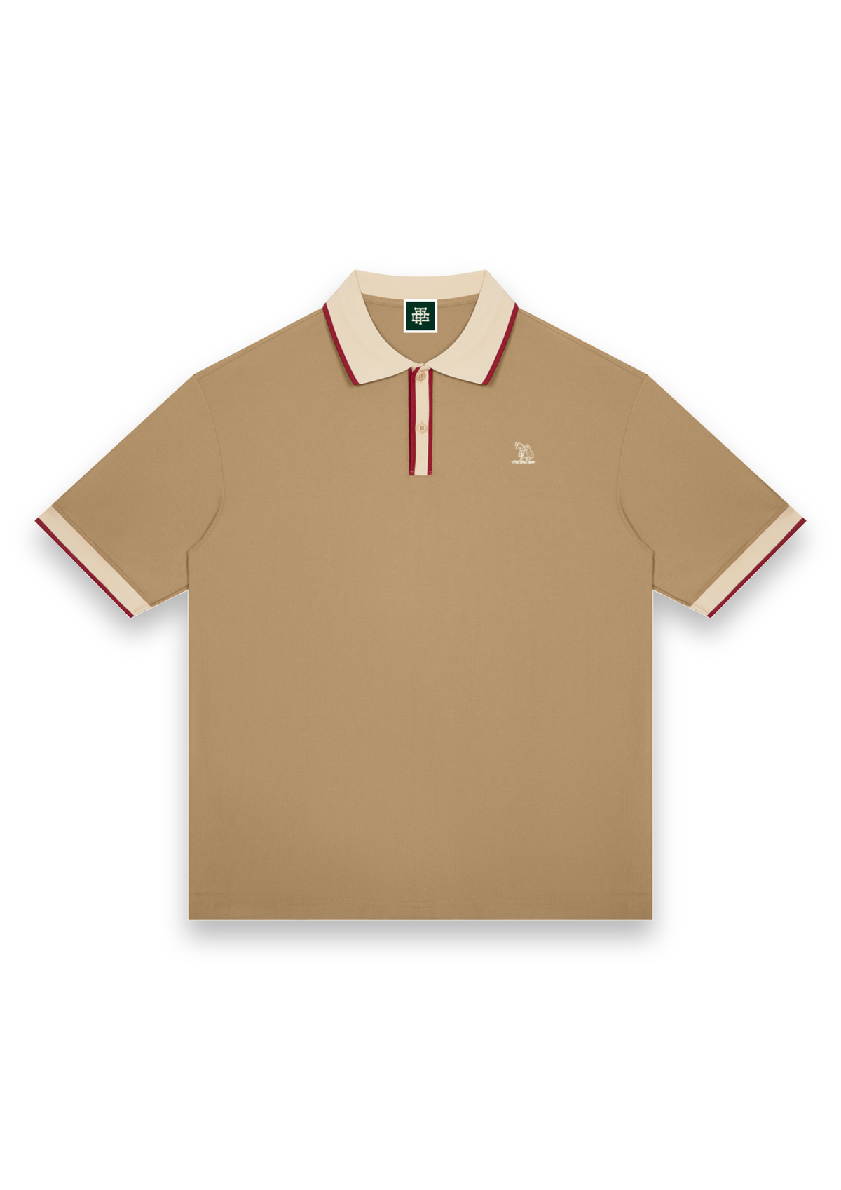 The Caddie retro golf polo shirt in Tan with Cream, front view with cream and red tipping on the collar, placket and cuffs and the Three Putt cow carrying its golf bag on the chest #Colour_Tan with Cream