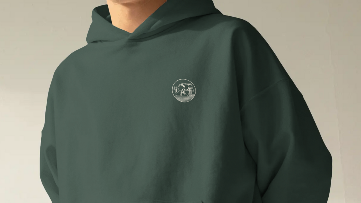 Forest green Three Putt Golf hoodie with the cow emblem on the chest