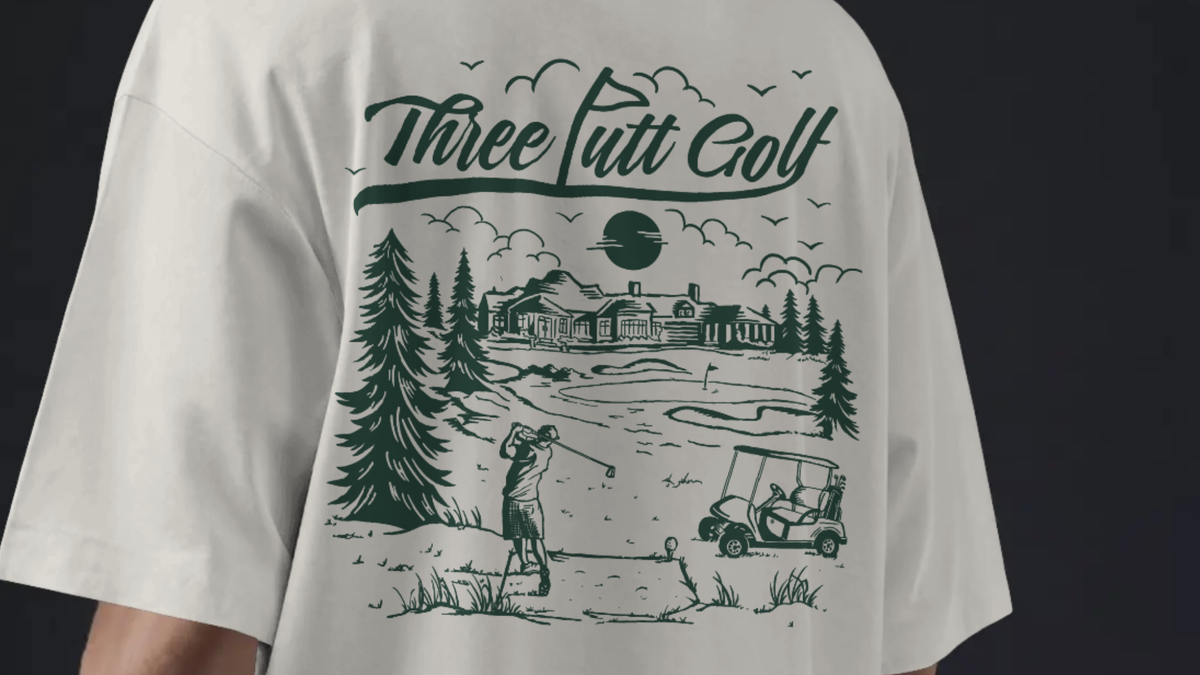 Back of The Scenic Route golf T-shirt, showing the hand-drawn course vista and Three Putt Golf script
