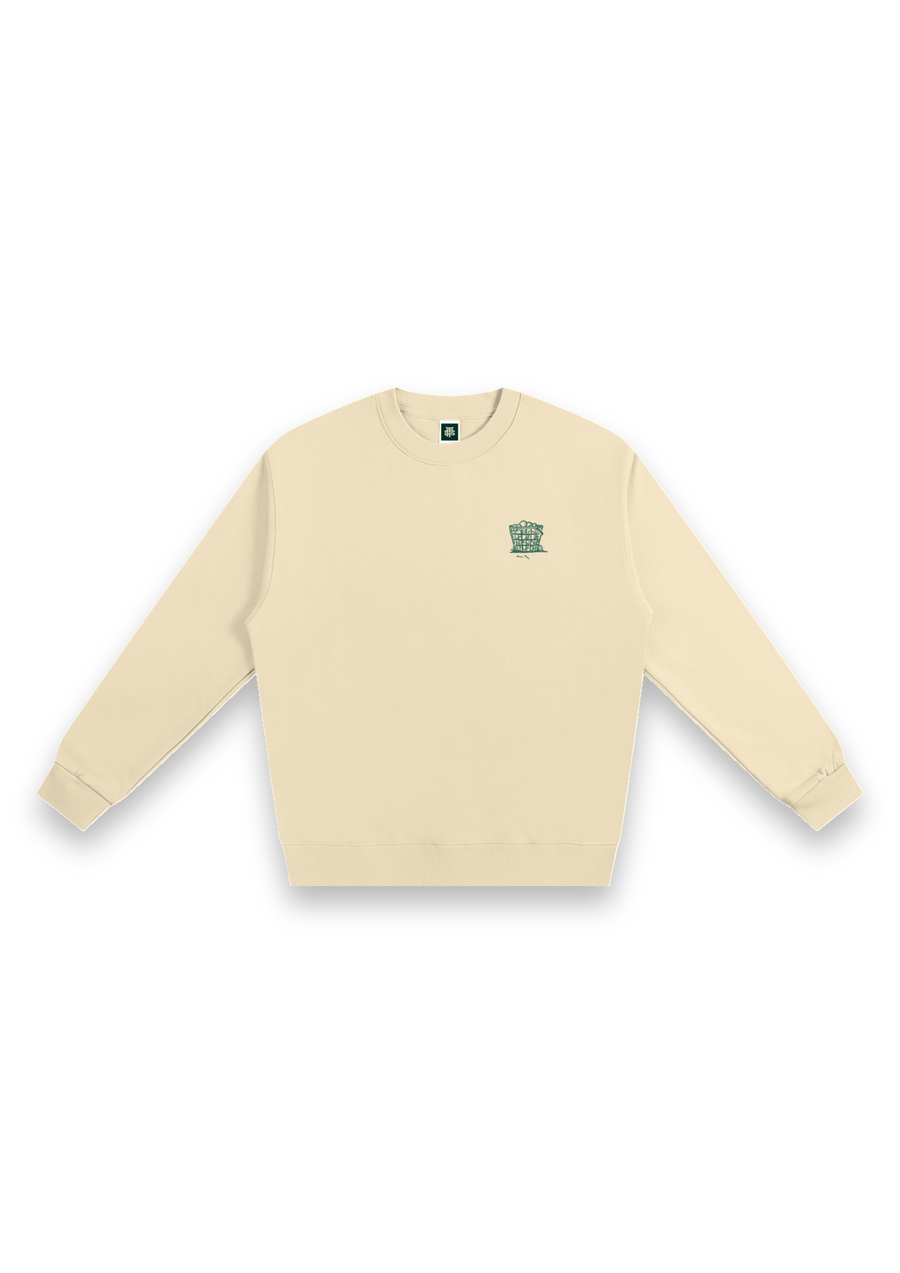 Happy Place golf sweatshirt in Cream, front view with the range-ball basket on the chest