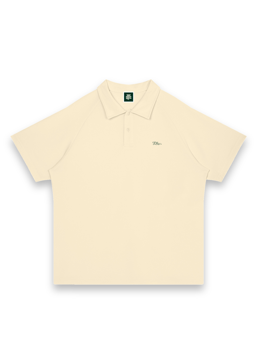 Pin High golf polo shirt in Cream, front view with the TPG flag mark on the chest #Colour_Cream