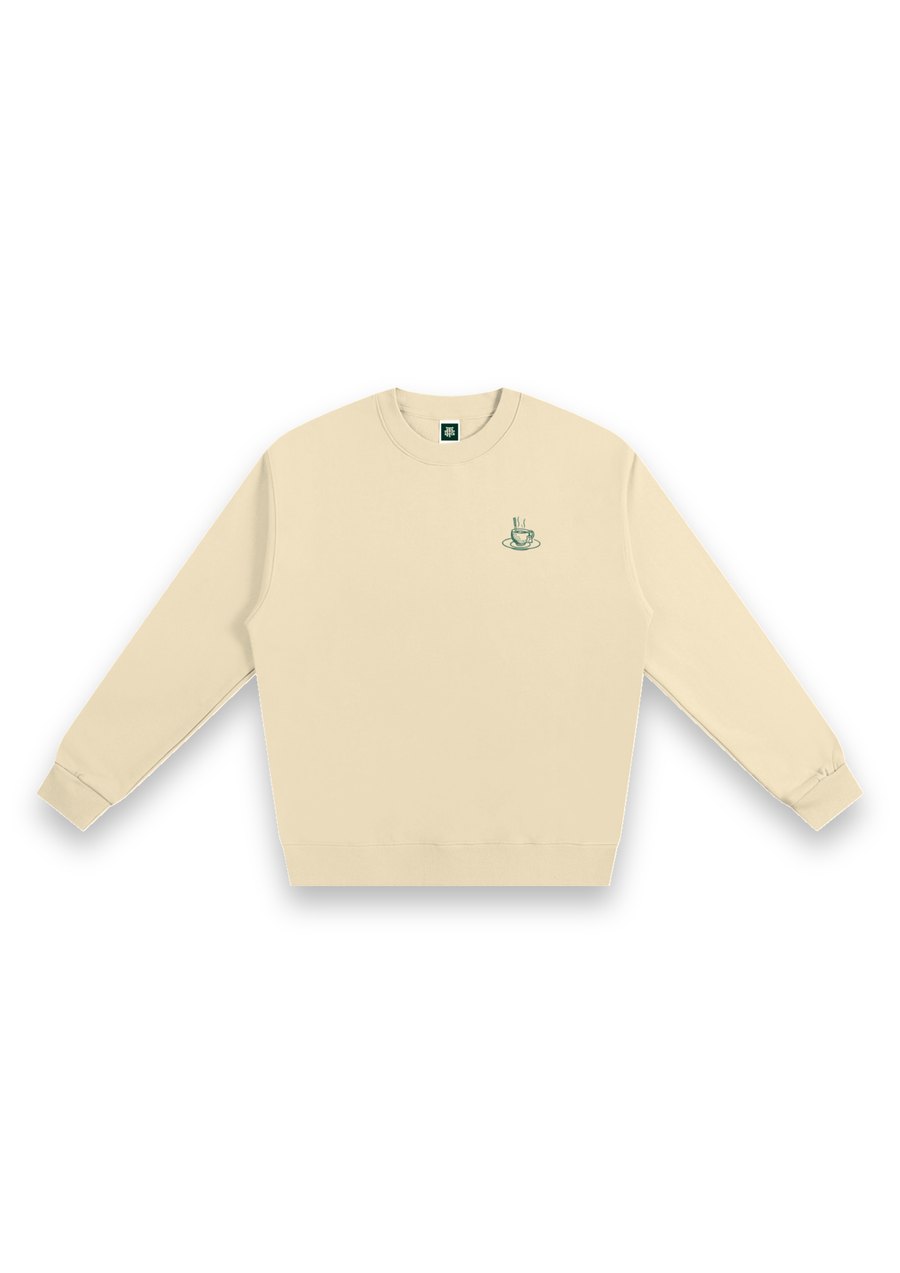 Tee Time golf sweatshirt in Cream, front view with the teacup print on the chest
