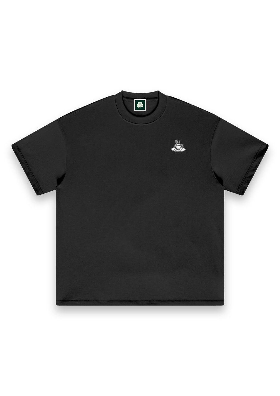 Tee Time golf T-shirt in Black, front view with the teacup print on the chest